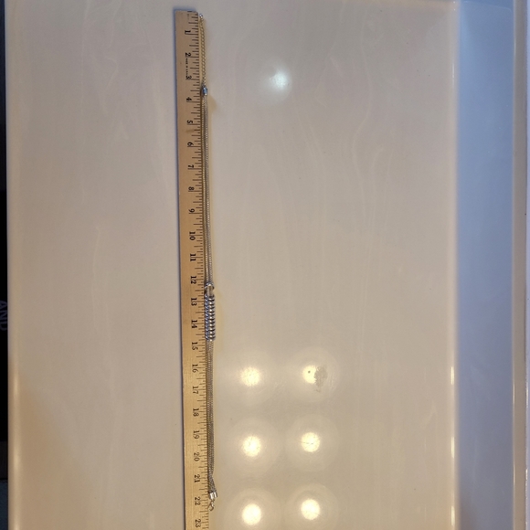 Serpentine bi-strand silver-tone necklace w/ silver-tone ring pendants - Picture 6 of 10